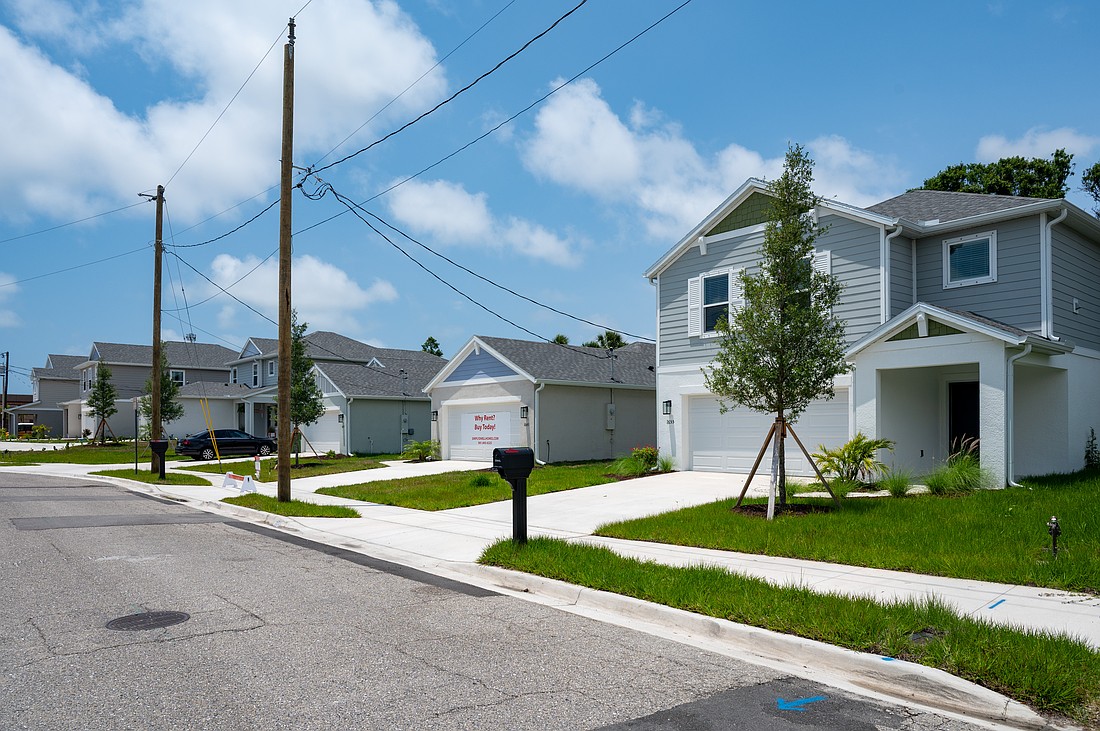 SimplyDwell Homes built 7 houses on a Sarasota property across from Booker High School that had fallen into disrepair.